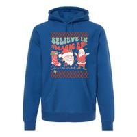 Believe In Magic Of Christmas Groovy Retro Christmas Santa Funny Gift Premium Hoodie