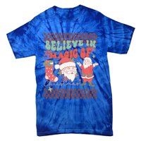 Believe In Magic Of Christmas Groovy Retro Christmas Santa Funny Gift Tie-Dye T-Shirt