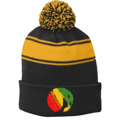 Black Woman with African Colors Afro Hairstyle Stripe Pom Pom Beanie