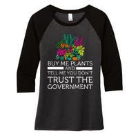 Buy Me Plants And Tell Me You Don't Trust The Government Women's Tri-Blend 3/4-Sleeve Raglan Shirt