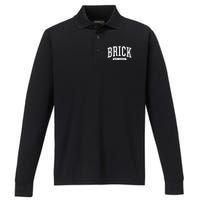 Brick New Jersey Souvenirs College Style Brick New Jersey Souvenir Performance Long Sleeve Polo