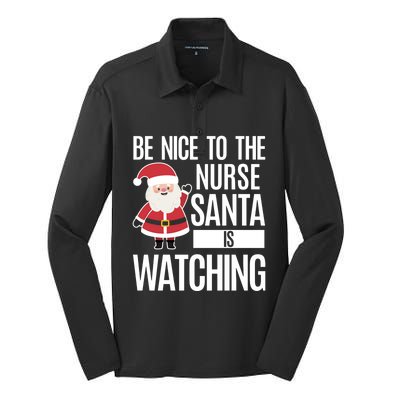 Be Nice To The Nurse Santa Is Watching Gift Silk Touch Performance Long Sleeve Polo