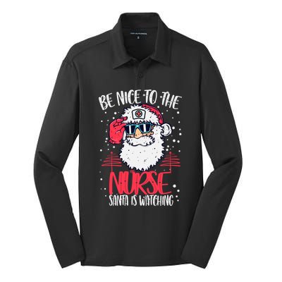 Be Nice To The Nurse Santa Is Watching Nurse Christmas Gift Silk Touch Performance Long Sleeve Polo