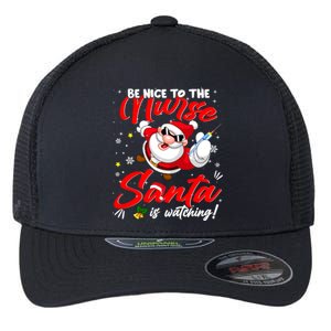 Be Nice To The Nurse Santa Is Watching Xmas Naughty Gift Flexfit Unipanel Trucker Cap