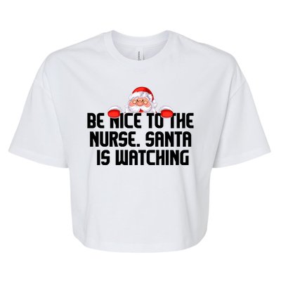 Be Nice To The Nurse Santa Is Watching Bella+Canvas Jersey Crop Tee