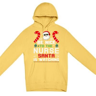 Be Nice To The Nurse Santa Is Watching Funny Christmas Nurse Gift Premium Pullover Hoodie