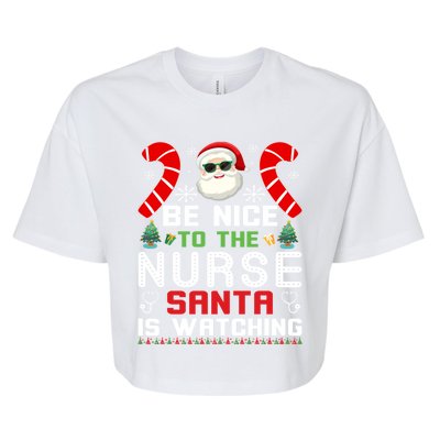 Be Nice To The Nurse Santa Is Watching Funny Christmas Nurse Gift Bella+Canvas Jersey Crop Tee