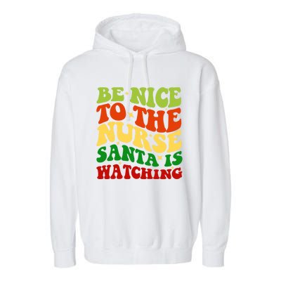 Be Nice To The Nurse Santa Is Watching Matching Christmas Gift Garment-Dyed Fleece Hoodie