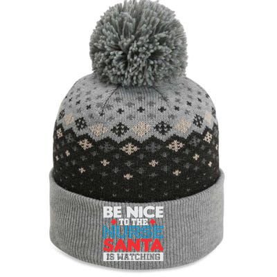 Be Nice To The Nurse Santa Is Watching Christmas Design Gift The Baniff Cuffed Pom Beanie