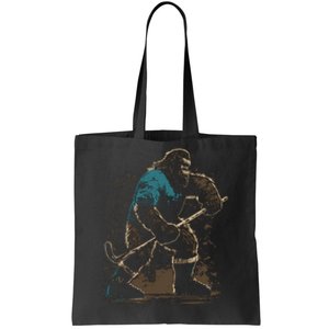 Bigfoot Playing Hockey Tote Bag