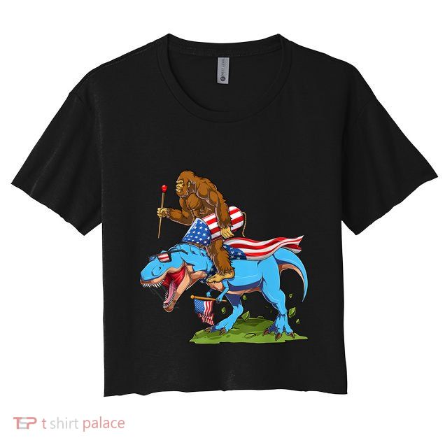 Bigfoot Riding Dinosaur USA Flag 4th Of July America Crop Top