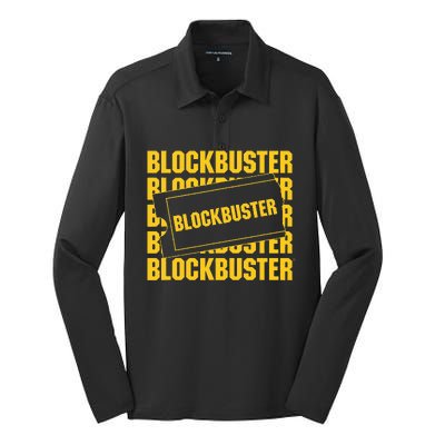 Blockbuster Repeating Logo With Ticket Silk Touch Performance Long Sleeve Polo