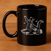 Bigfoot Riding Nessie 11oz C Handle Ceramic Mug