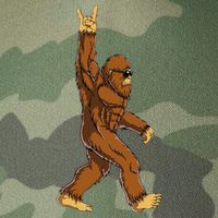Bigfoot Rock On Sasquatch Rock And Roll Funny Legacy Tie Dye Trucker Hat