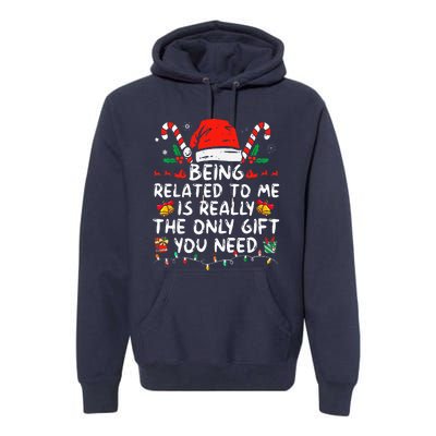 Being Related To Me Funny Christmas Family Xmas Pajamas  Premium Hoodie