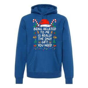 Being Related To Me Funny Christmas Family Xmas Pajamas  Premium Hoodie