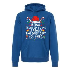 Being Related To Me Funny Christmas Family Xmas Pajamas  Premium Hoodie