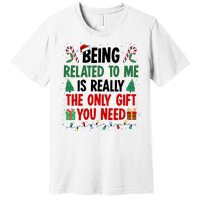 Being Related To Me Funny Christmas Family Xmas Premium T-Shirt