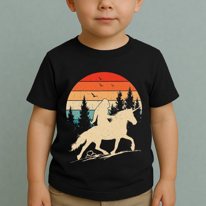 Bigfoot Riding Unicorn! Funny Sasquatch Unicorn Retro Sunset Toddler T-Shirt
