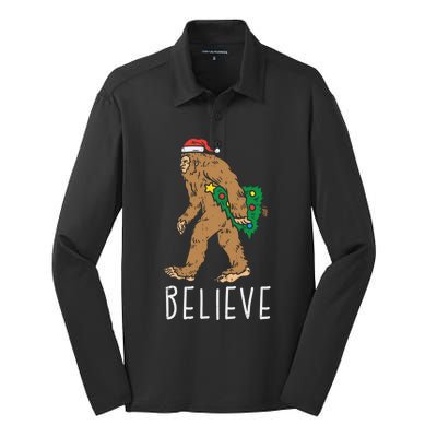 Believe Sasquatch Bigfoot Santa Hat Fun Christmas Tree Gift Silk Touch Performance Long Sleeve Polo