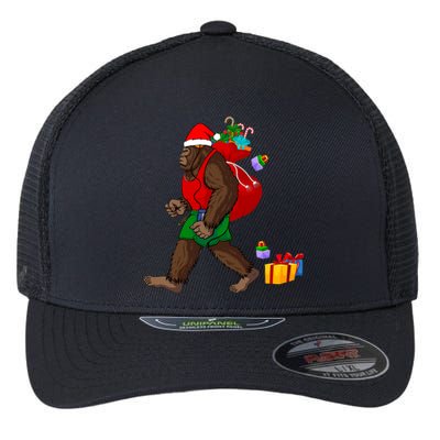 Bigfoot Santa Carrying Christmas Bag Xmas Hat Sasquatch Flexfit Unipanel Trucker Cap