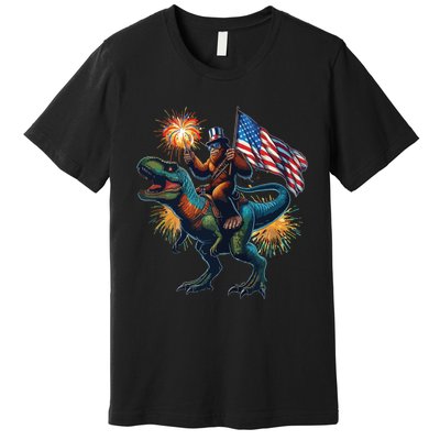 Bigfoot Sasquatch Riding Dinosaur T Rex Funny 4th Of July Premium T-Shirt