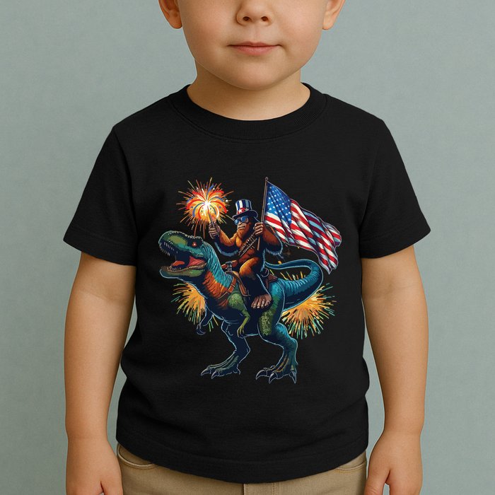 Bigfoot Sasquatch Riding Dinosaur T Rex Funny 4th Of July Toddler T-Shirt