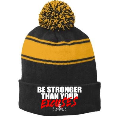 Brian Shaw Wearing Be Stronger Than Your Excuses Stripe Pom Pom Beanie