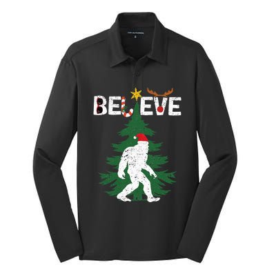 Bigfoot Sasquatch Yeti Believe santa hat Christmas Silk Touch Performance Long Sleeve Polo