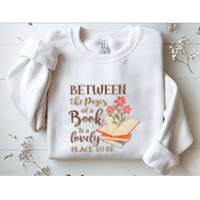 Between The Pages Of A Book Is A Lovely Place To Be Reading Books Sweatshirt
