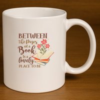 Between The Pages Of A Book Is A Lovely Place To Be Reading Books 11oz C Handle Ceramic Mug