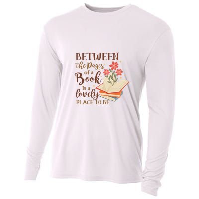 Between The Pages Of A Book Is A Lovely Place To Be Reading Books Cooling Performance Long Sleeve Crew