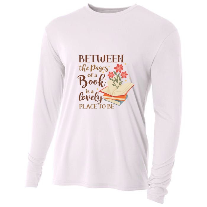 Between The Pages Of A Book Is A Lovely Place To Be Reading Books Cooling Performance Long Sleeve Crew
