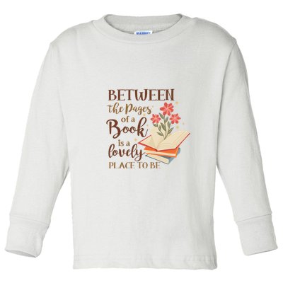 Between The Pages Of A Book Is A Lovely Place To Be Reading Books Toddler Long Sleeve Shirt