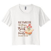 Between The Pages Of A Book Is A Lovely Place To Be Reading Books Crop Top