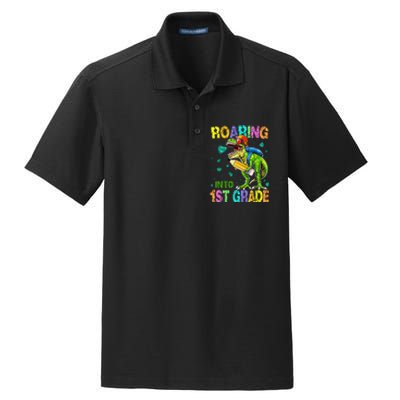 Back to School Dinosaur T Rex Roaring Into 1st Grade Dry Zone Grid Polo