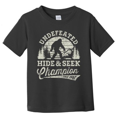 Bigfoot Undefeated Hide And Seek Champion Vintage Toddler T-Shirt