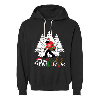 Bigfoot Wearing Christmas Pajamas Sasquatch And Xmas Tree Long Sleeve Garment-Dyed Fleece Hoodie