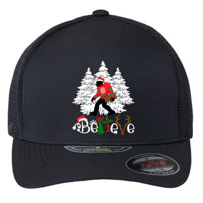 Bigfoot Wearing Christmas Pajamas Sasquatch And Xmas Tree Long Sleeve Flexfit Unipanel Trucker Cap