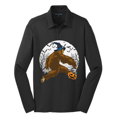 Bigfoot Witch Holding Halloween Pumpkin For Sasquatch Lovers Silk Touch Performance Long Sleeve Polo