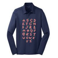 Christmas Alphabet Candy Cane Xmas Holiday Teacher Silk Touch Performance Long Sleeve Polo