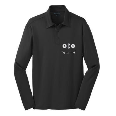 Cute And Spooky Halloween Monster Face Wth Orange Silk Touch Performance Long Sleeve Polo