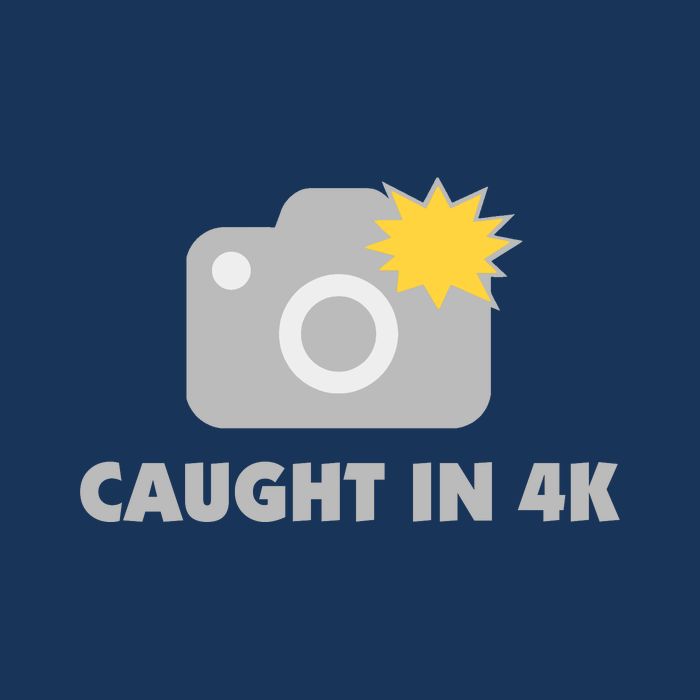 Caught In 4K Flat Bill Trucker Hat
