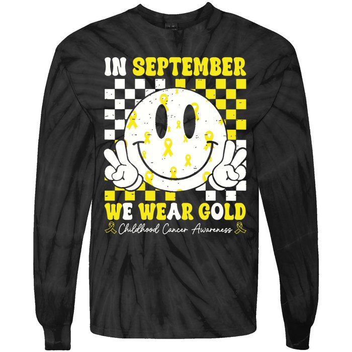 Childhood Cancer Awareness In September We Wear Gold Groovy Tie-Dye Long Sleeve Shirt