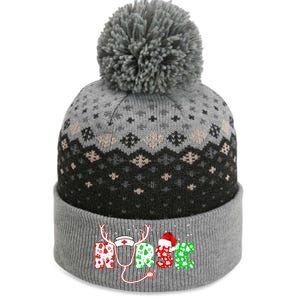 Cute Christmas Nurse Logo The Baniff Cuffed Pom Beanie