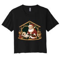 Christmas Design Kneeling Santa Claus With Baby Jesus Women's Crop Top Tee
