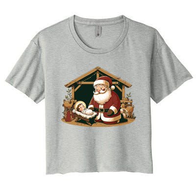 Christmas Design Kneeling Santa Claus With Baby Jesus Women's Crop Top Tee