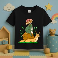 Cute Frog Riding A Snail A Whimsical Illustration Toddler T-Shirt