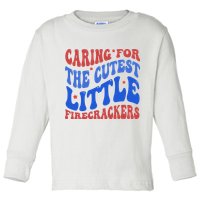 Caring For The Cutest Little Firecrackers 4th Of July Toddler Long Sleeve Shirt