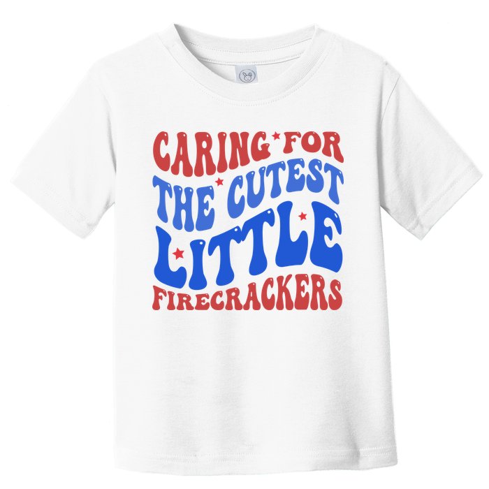 Caring For The Cutest Little Firecrackers 4th Of July Toddler T-Shirt